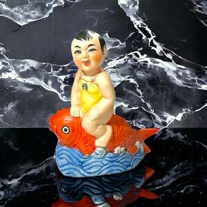 Vtg Ceramic Asian Lucky Child Riding a Koi Fish Hand Painted Porcelain 5.5x4.5”